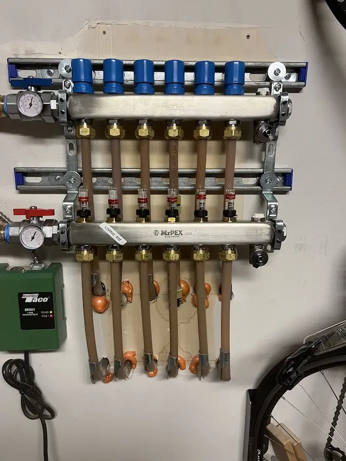 Plumber performing Leak Detection at a residential property in Ossian